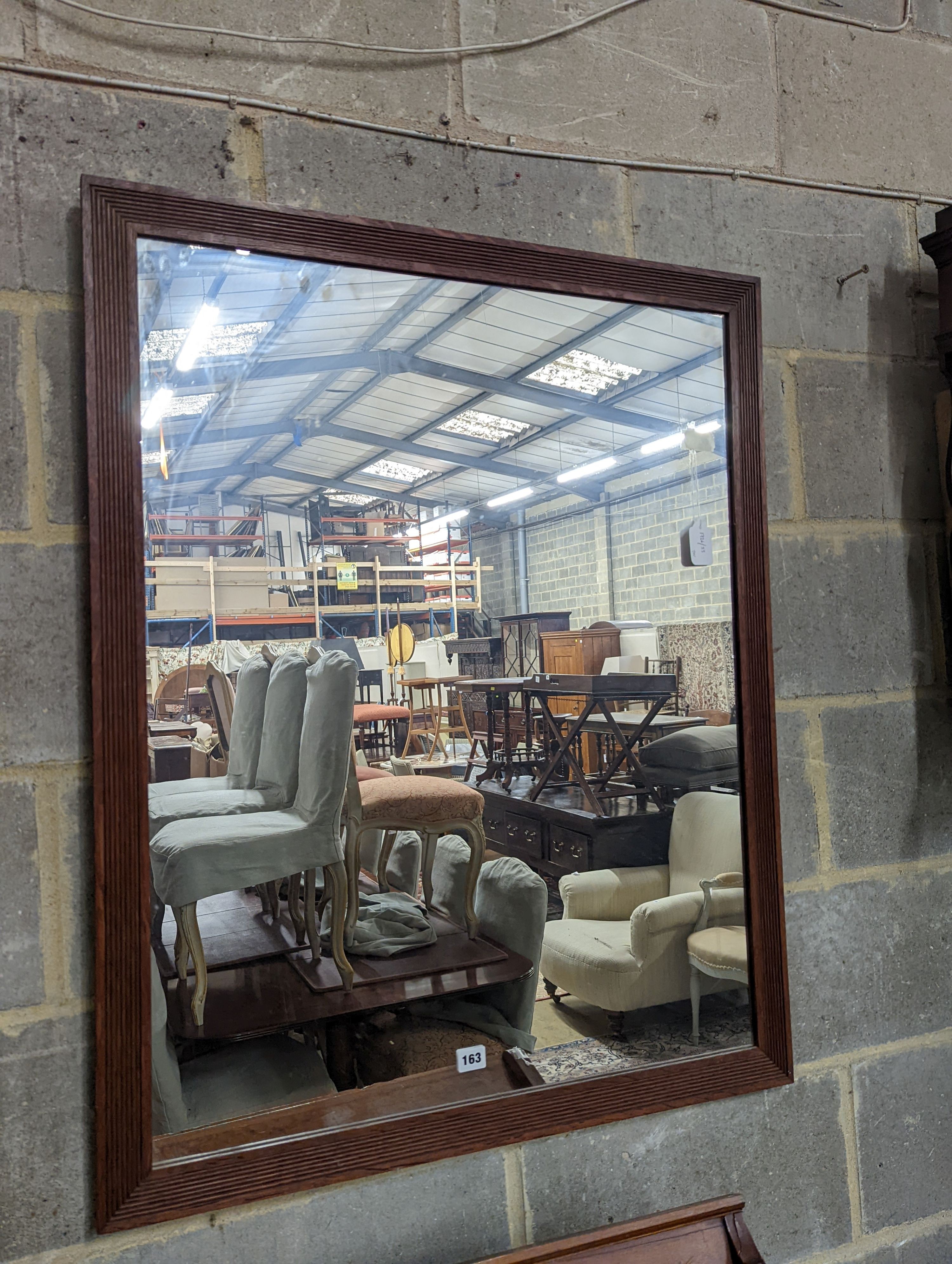 An oak framed rectangular wall mirror with fluted border, width 79cm, height 99cm